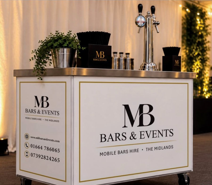 An MB Bars & Events cart bar finished in personalised branding at an indoor event