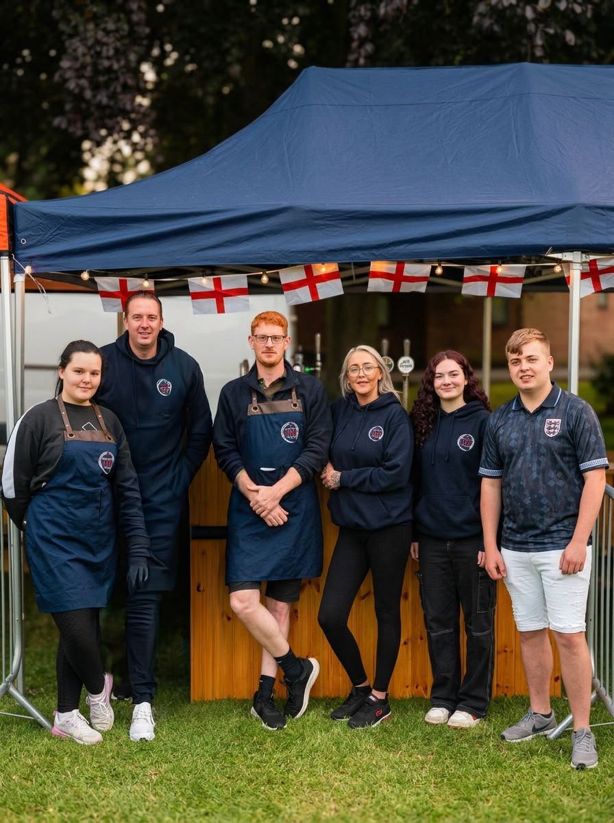 The MB Bars & Events team under the bar canopy at a summer event